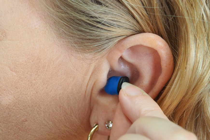 Surgical Implantation Of A Bluetooth Device In The Ear
