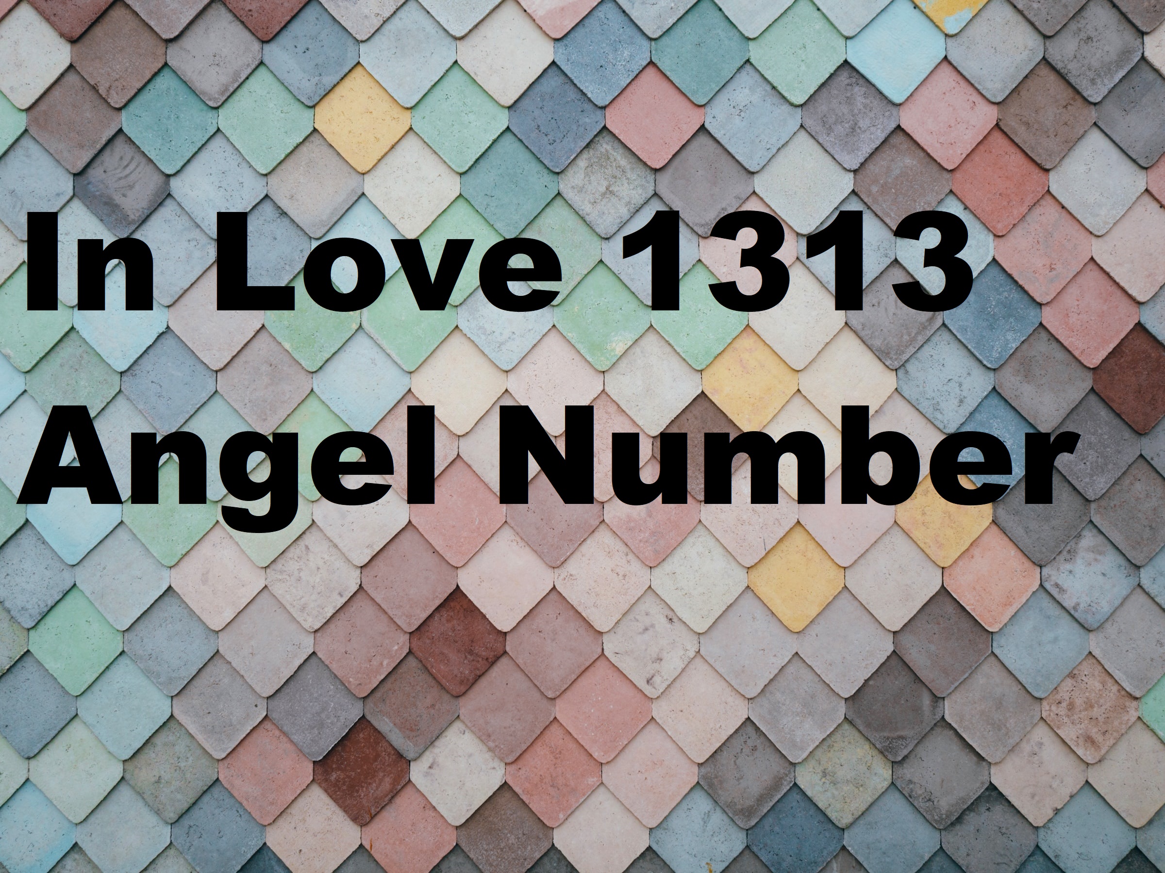 In Love 1313 Angel Number text in black font color written on a colorfol tiled wall