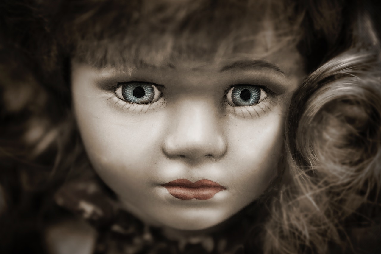 Doll With Blue Eyes and Brown Hair