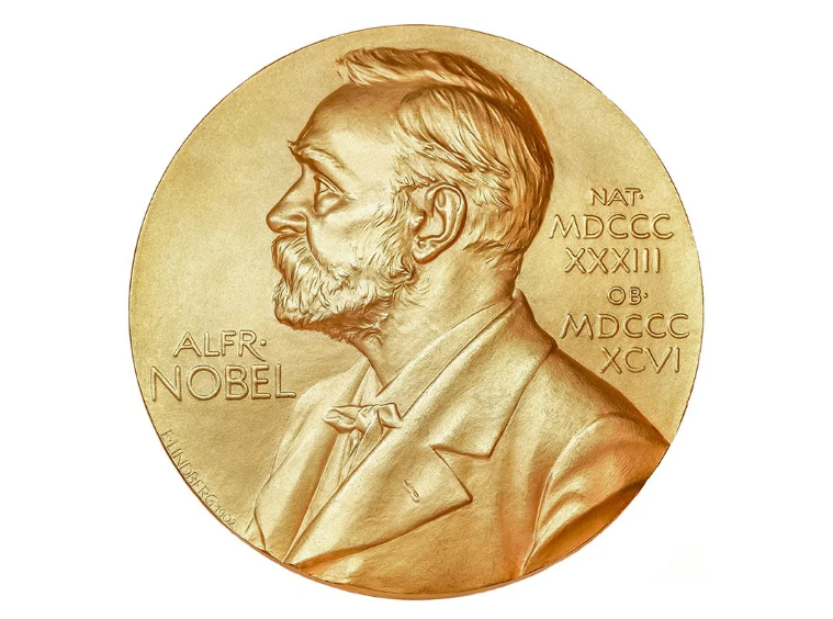 A golden coin with the head of Alfred Bernhard Nobel that represents the Nobel Prize