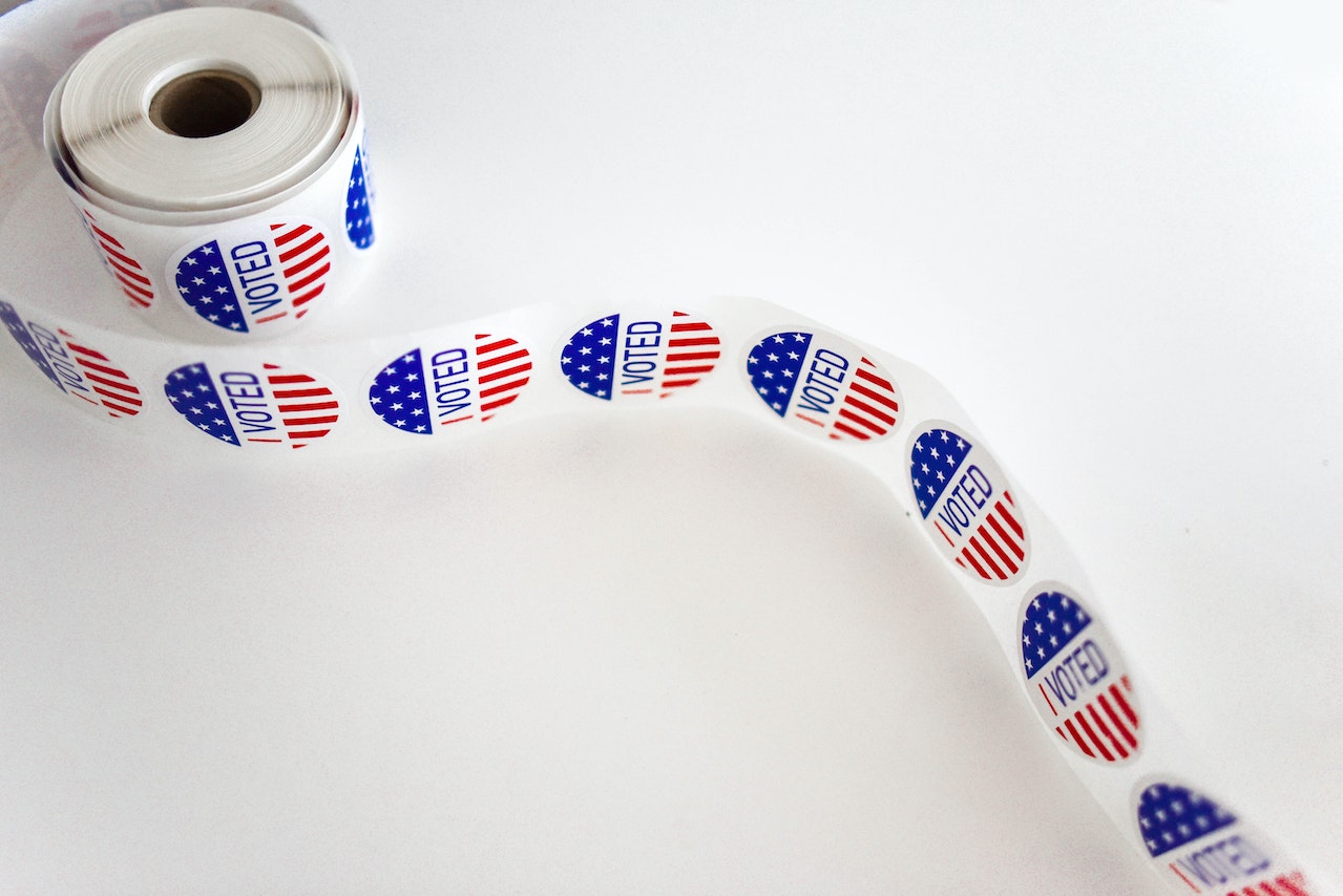 A Voted Sticker Spool on White Surface