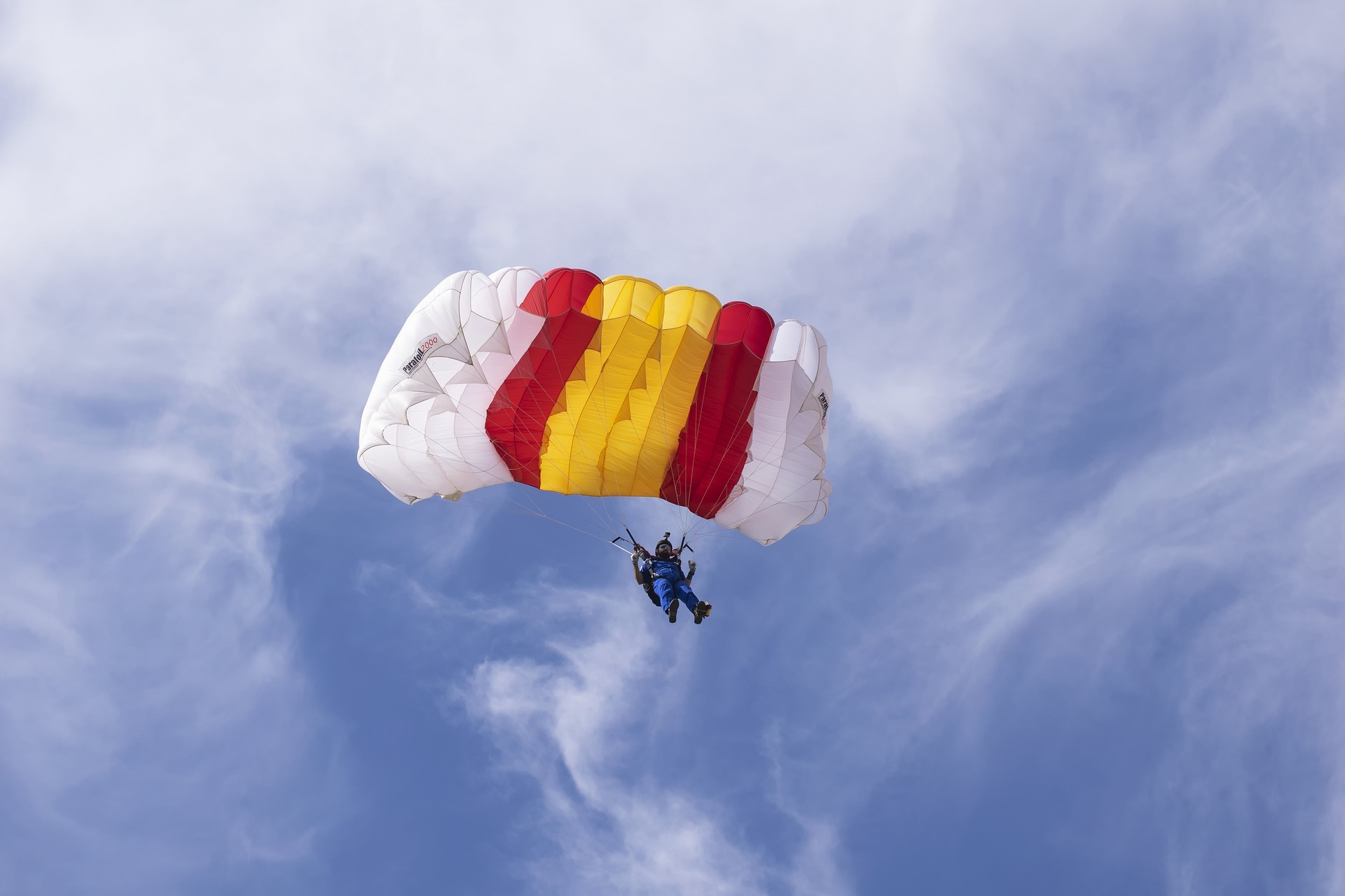 A skydiver with parachute