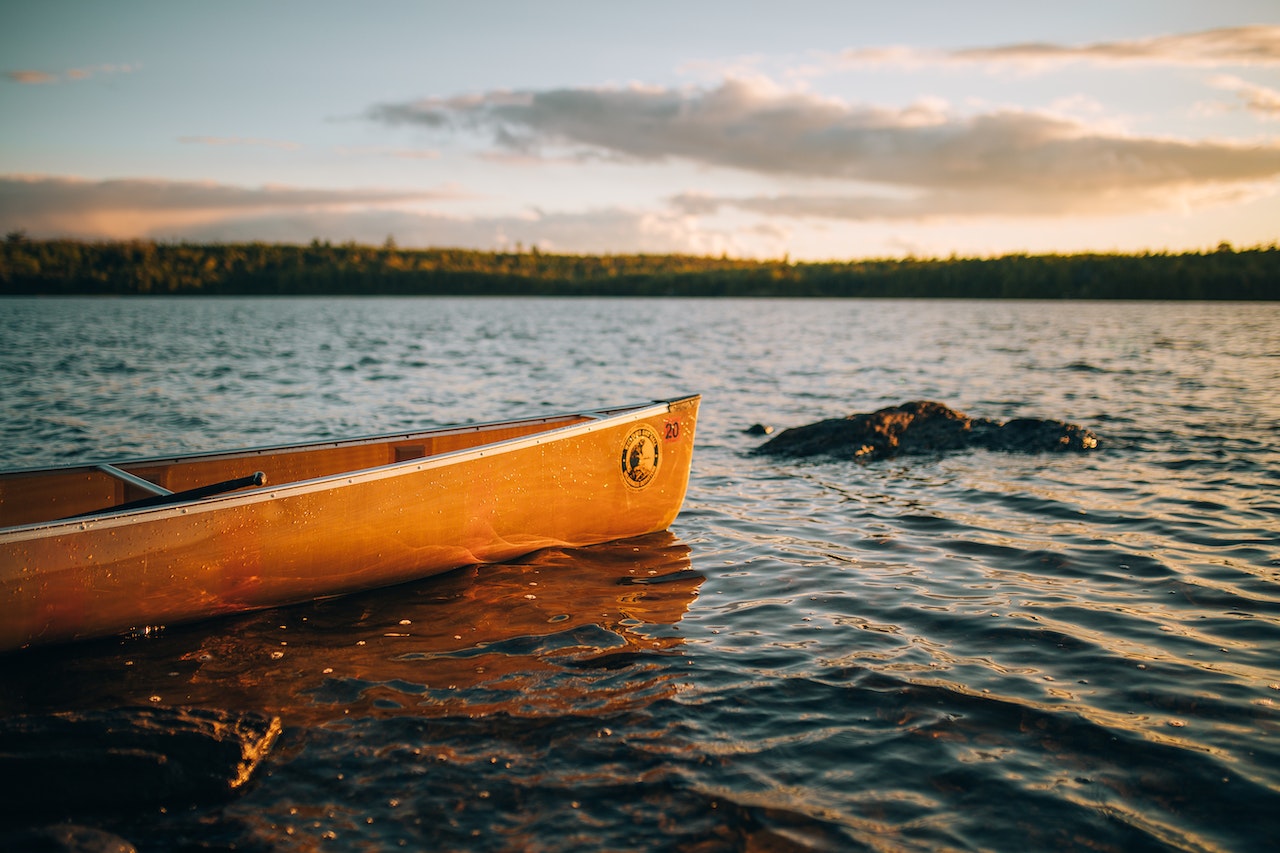 Yellow Canoe In The Lake