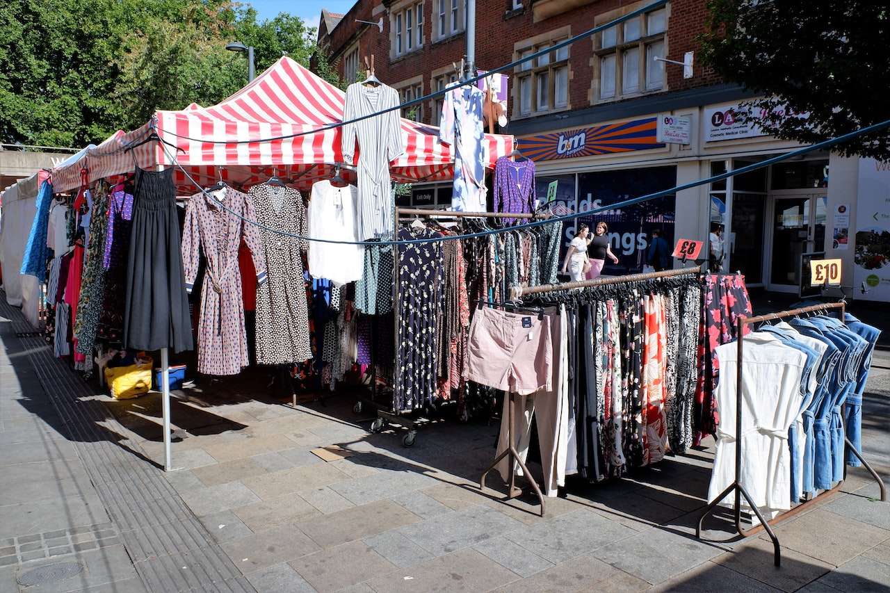 Stall with Variety of Clothes Displayed on Sale
