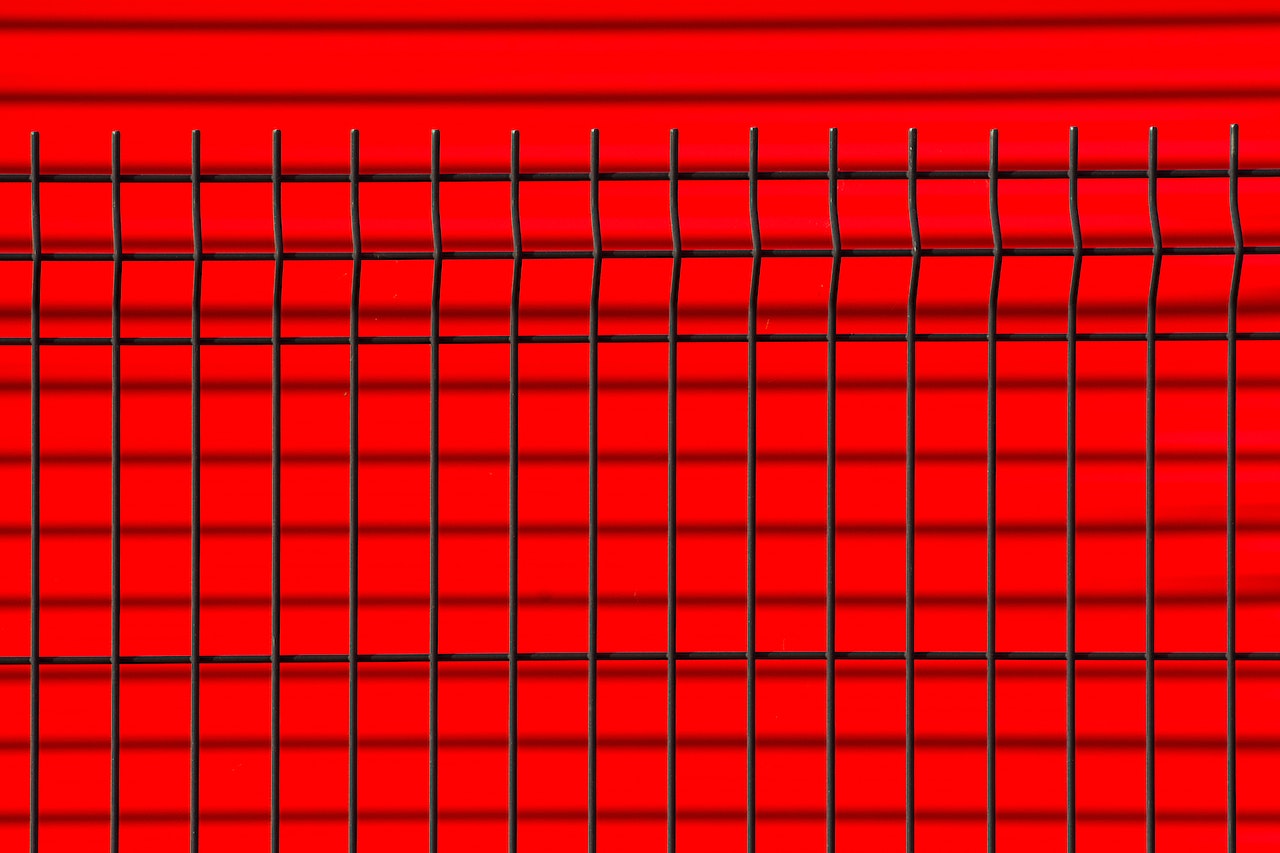 Fence on Red Background