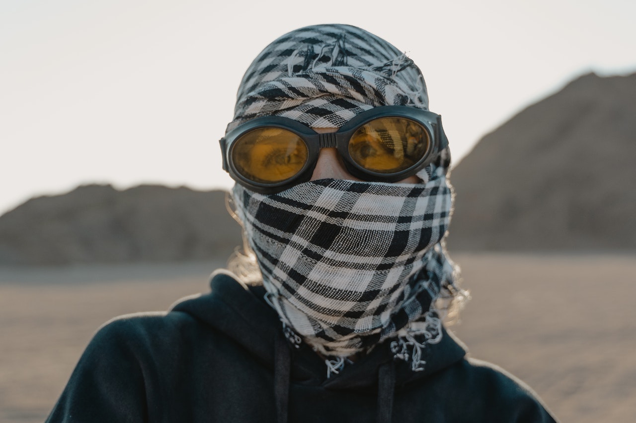 A Person Wearing a Headscarf and Goggles
