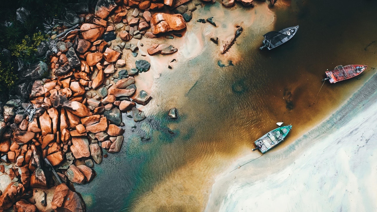 Aerial View of Boats On Seashore