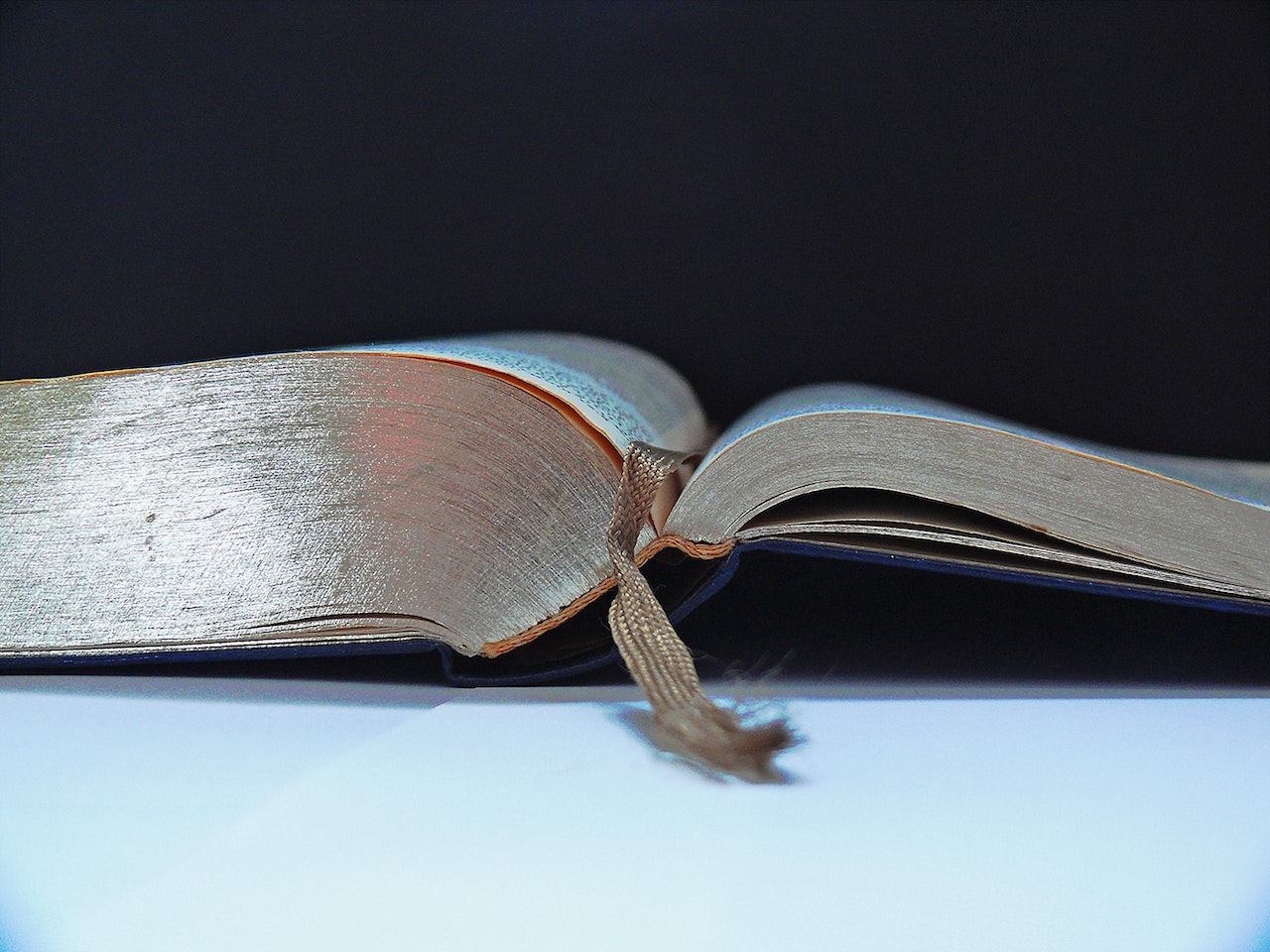 A Book With A Brown Bookmark