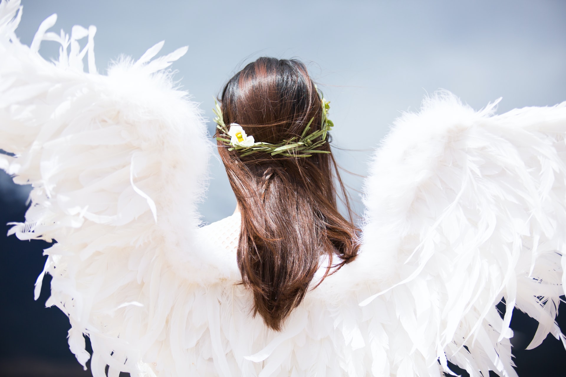 Women Wearing White Angel Wings
