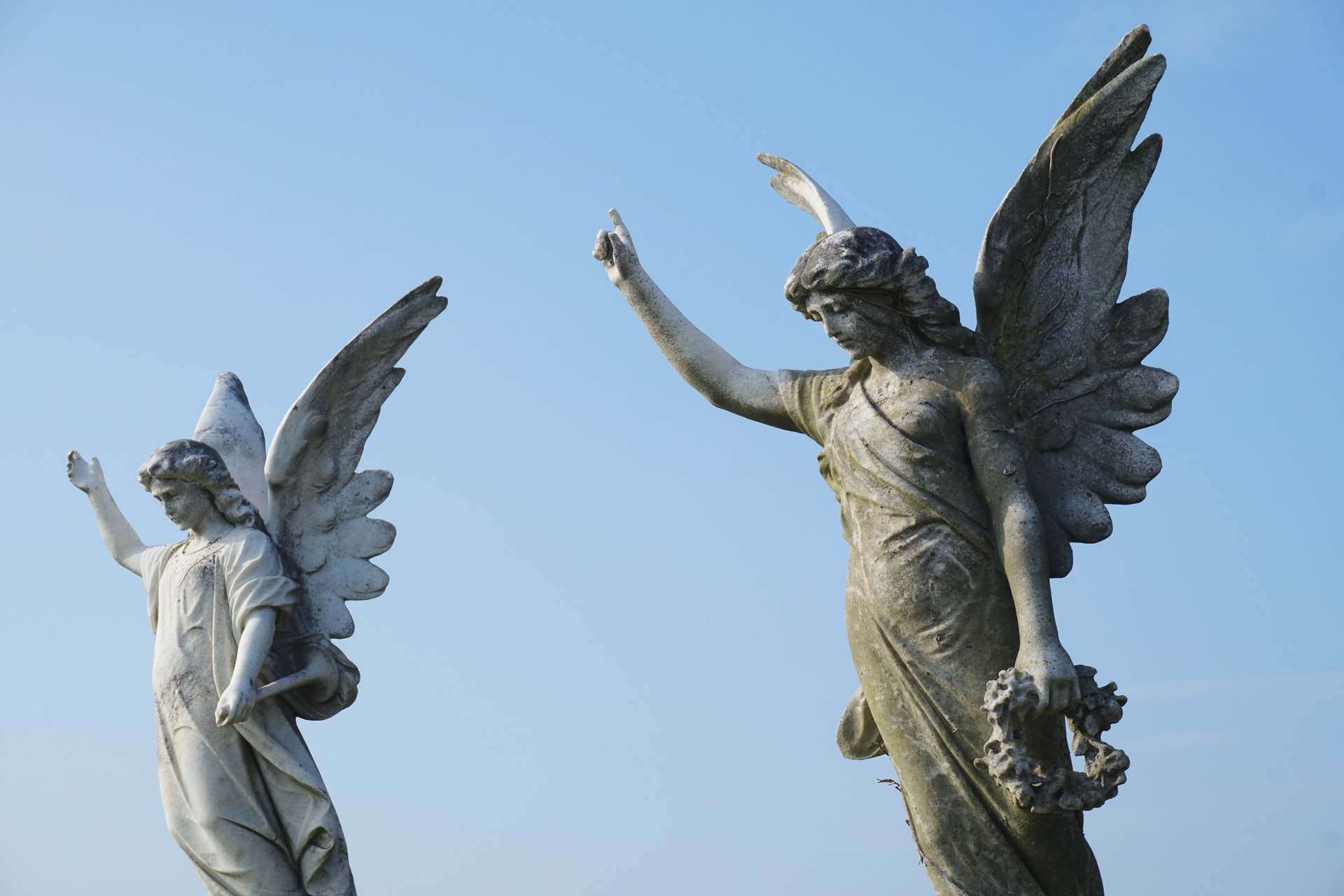Two Angel Statues Under The Sky