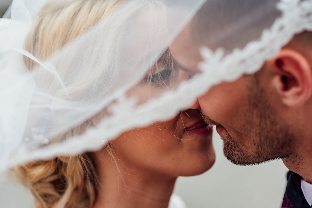 Groom and Bride Kissing