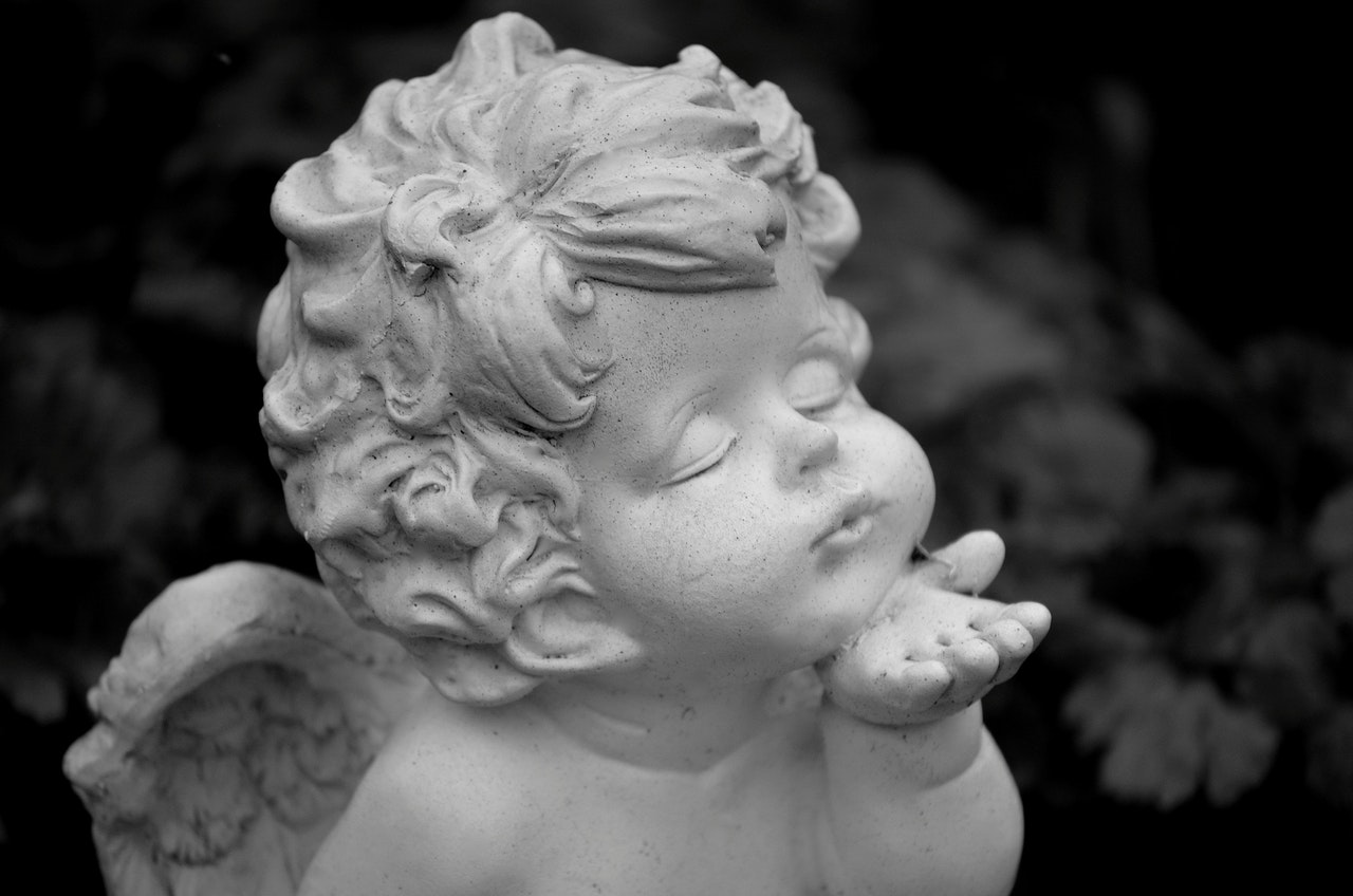 Baby Angel Statue Blowing A Kiss