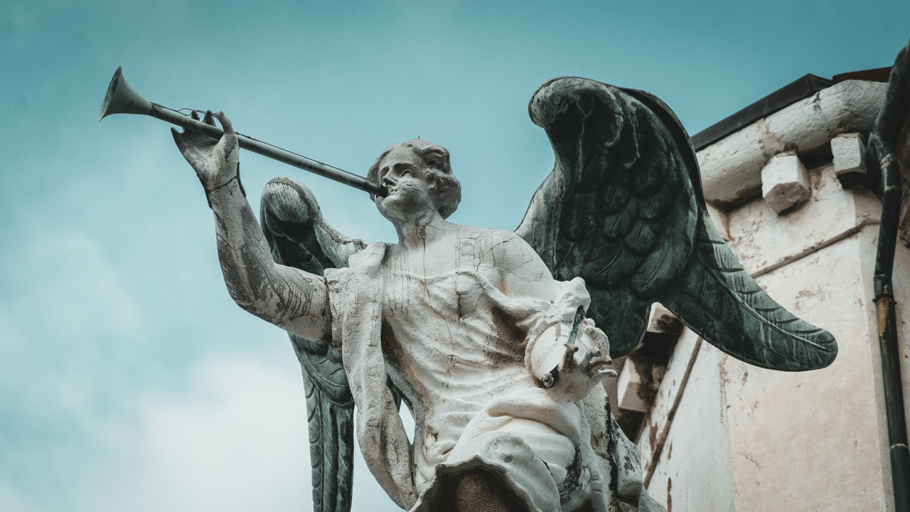 A Statue of an Angel Blowing a Trumpet.jpg