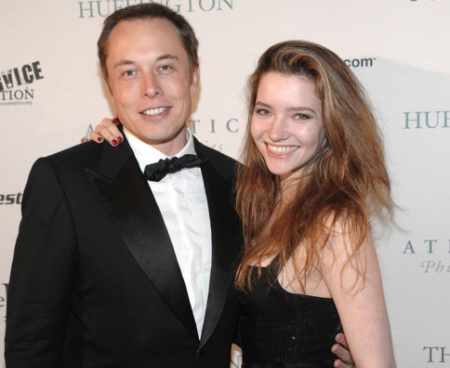 Saxon Musk parents Elon Musk and Justine Musk smiling