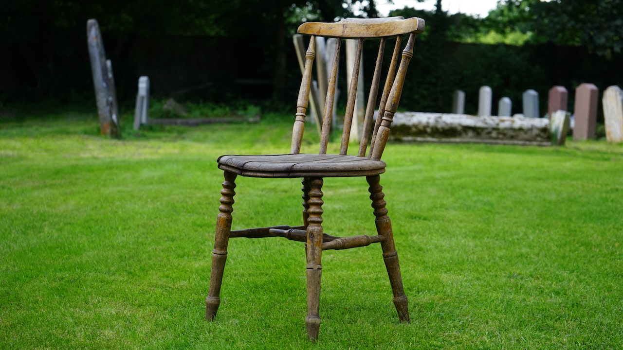Brown Wooden Chair in the grass