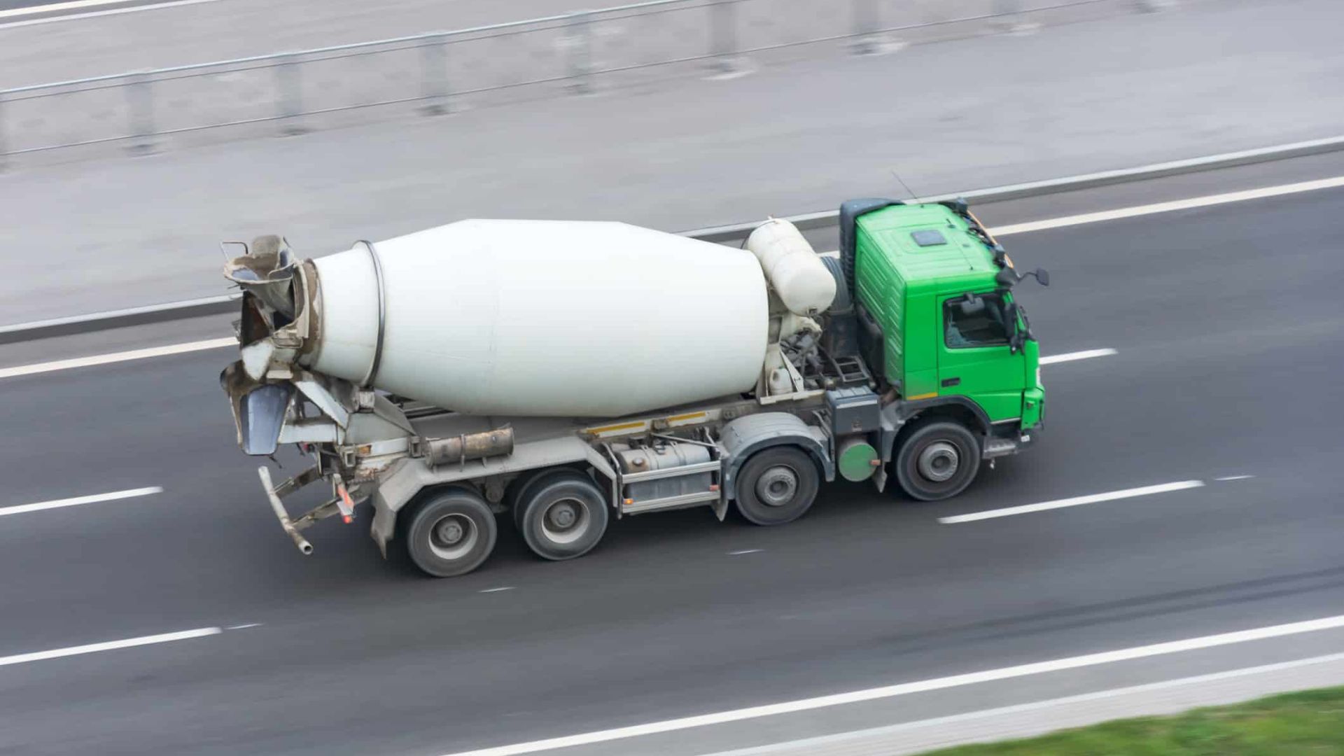 A Cement Truck Moving On Road