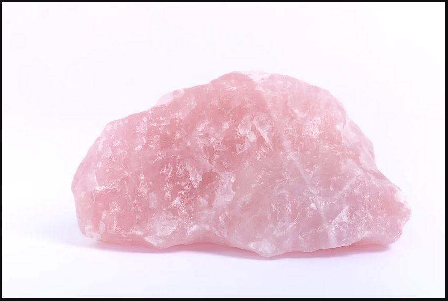 An uncut rose quartz crystal