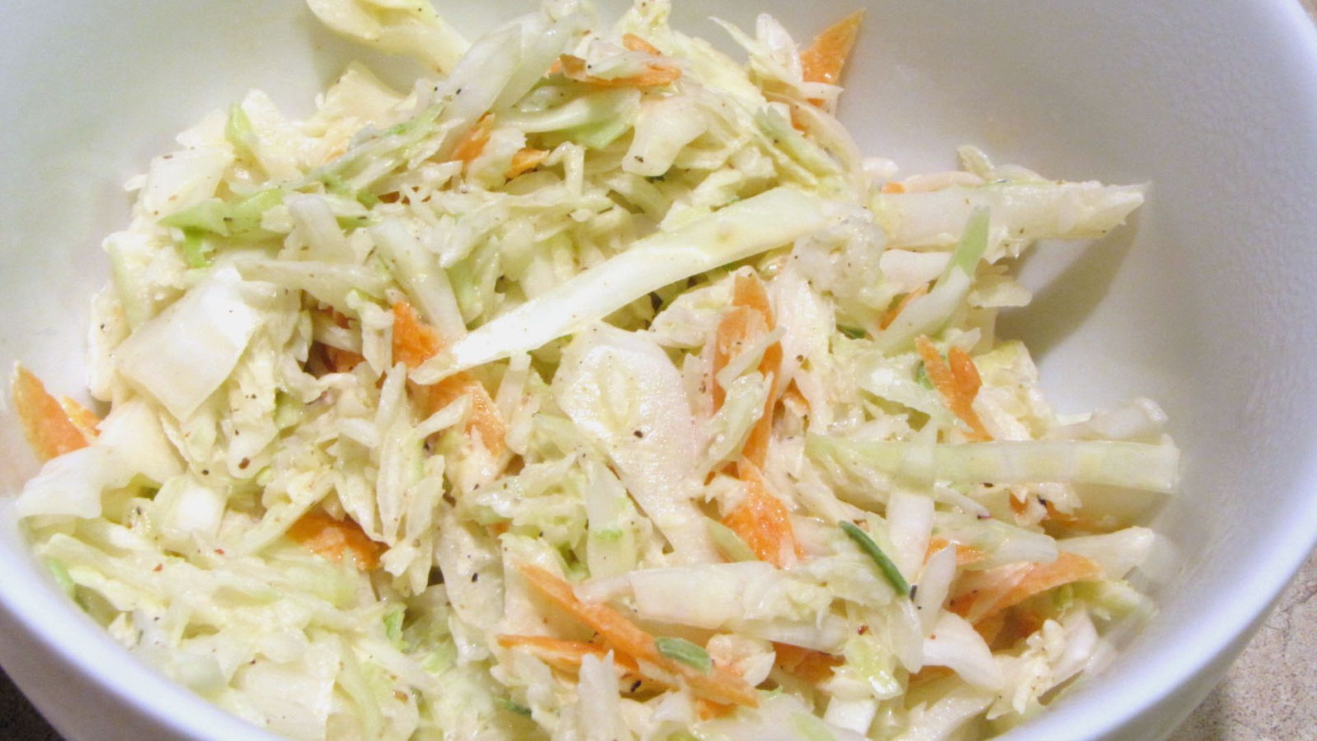 Tangy Coleslaw on a bowl