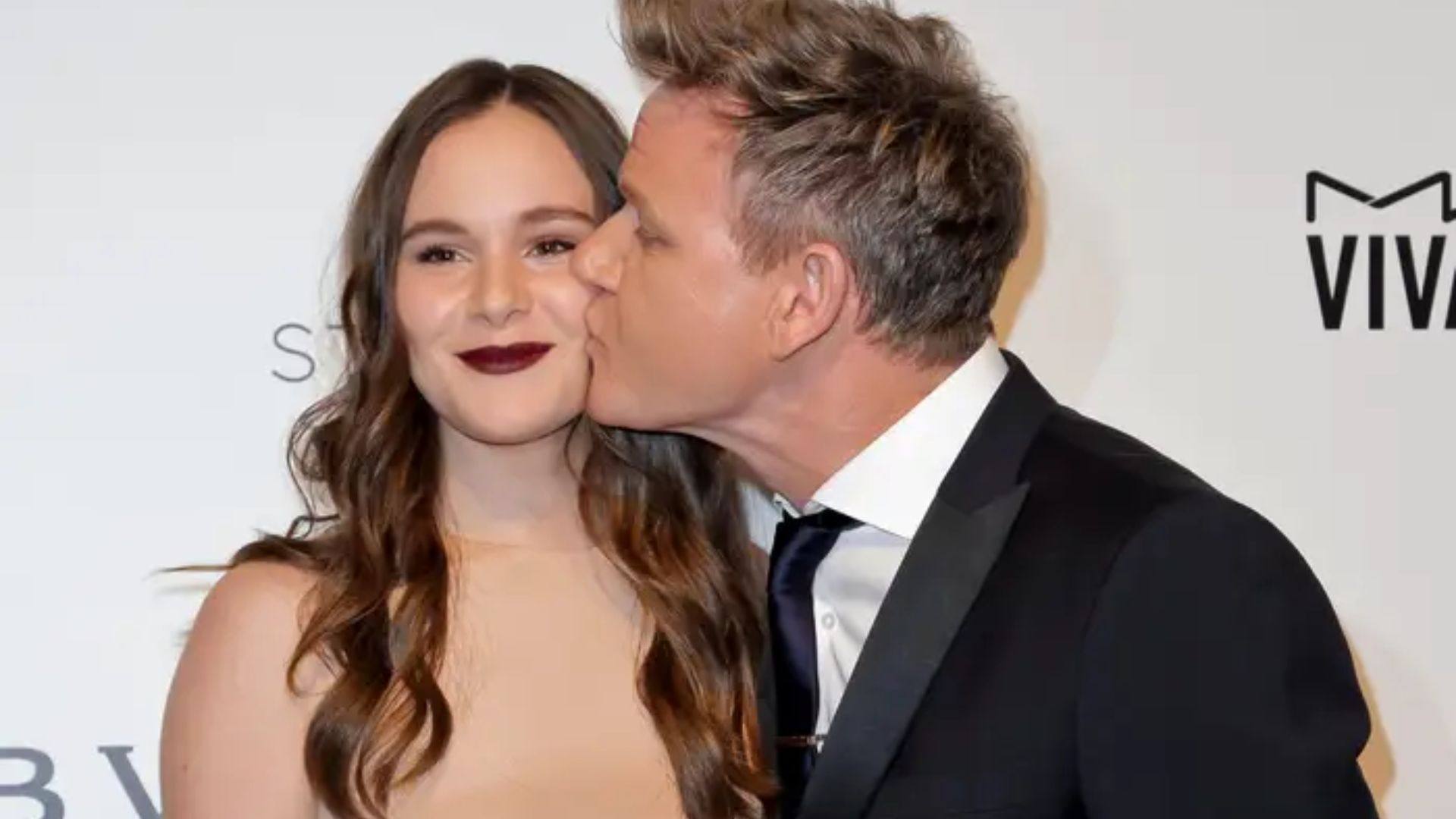  Holly Anna Ramsay Being KIssed On Cheeks By Her Father