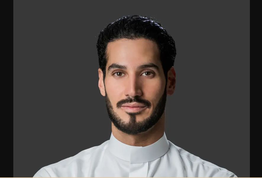 Hassan Jameel wearing a white clothe