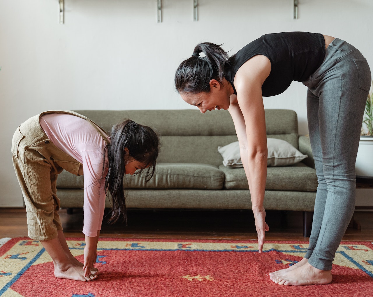 A mother and daughter exercising