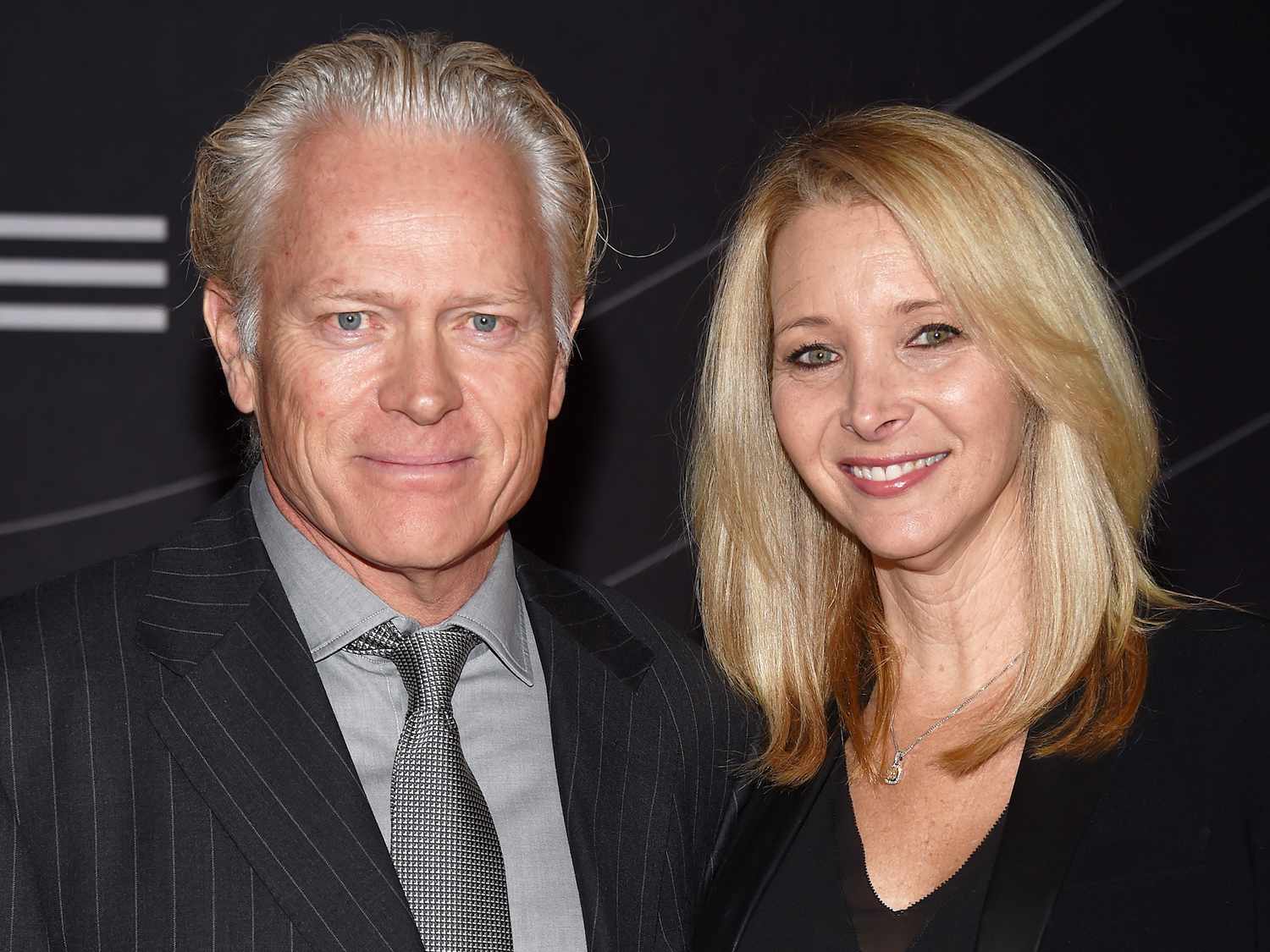 Michel Stern with his wife Lisa Kudrow at an event