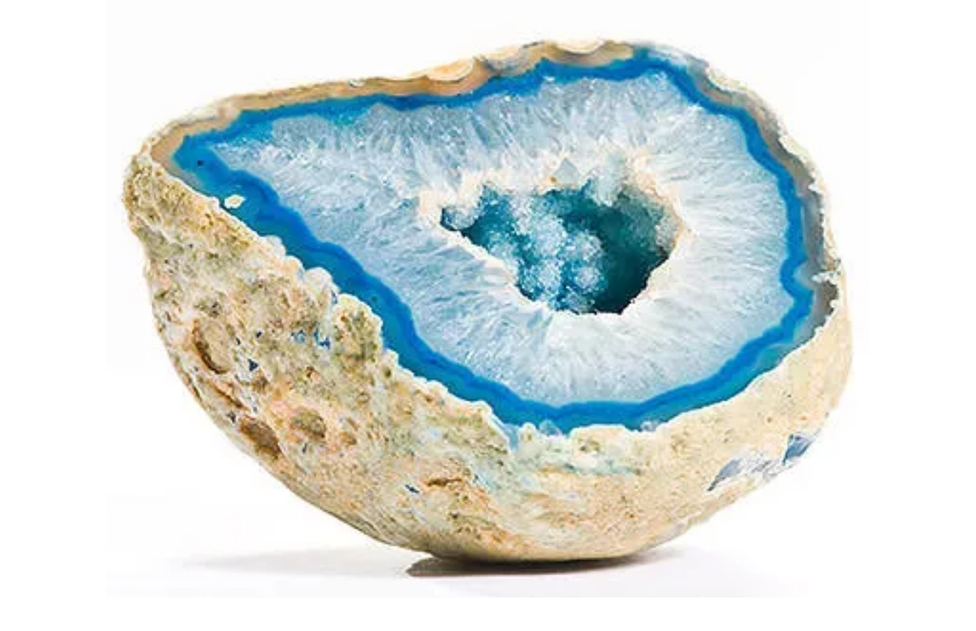 A semi-round rock with blue agate inside of it