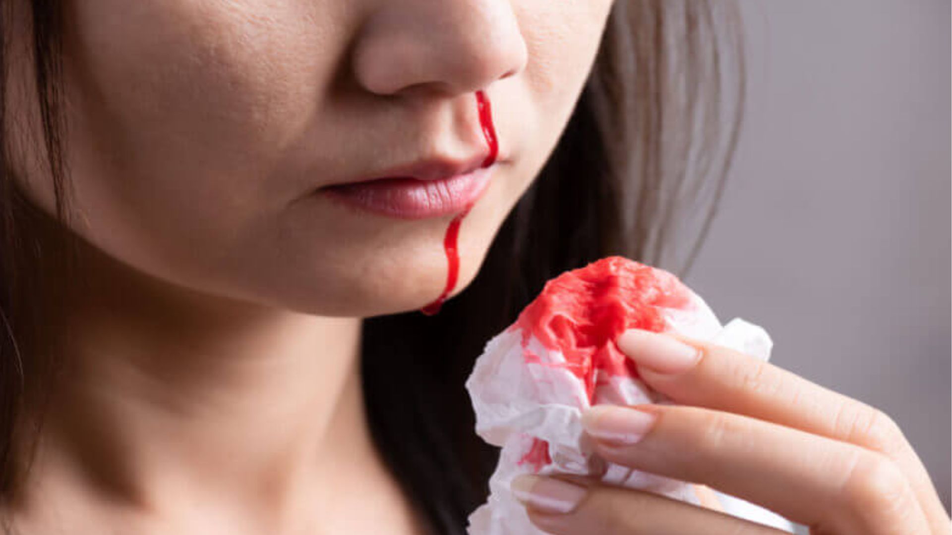 Girl Holding A Tissue With Alot Of Blood
