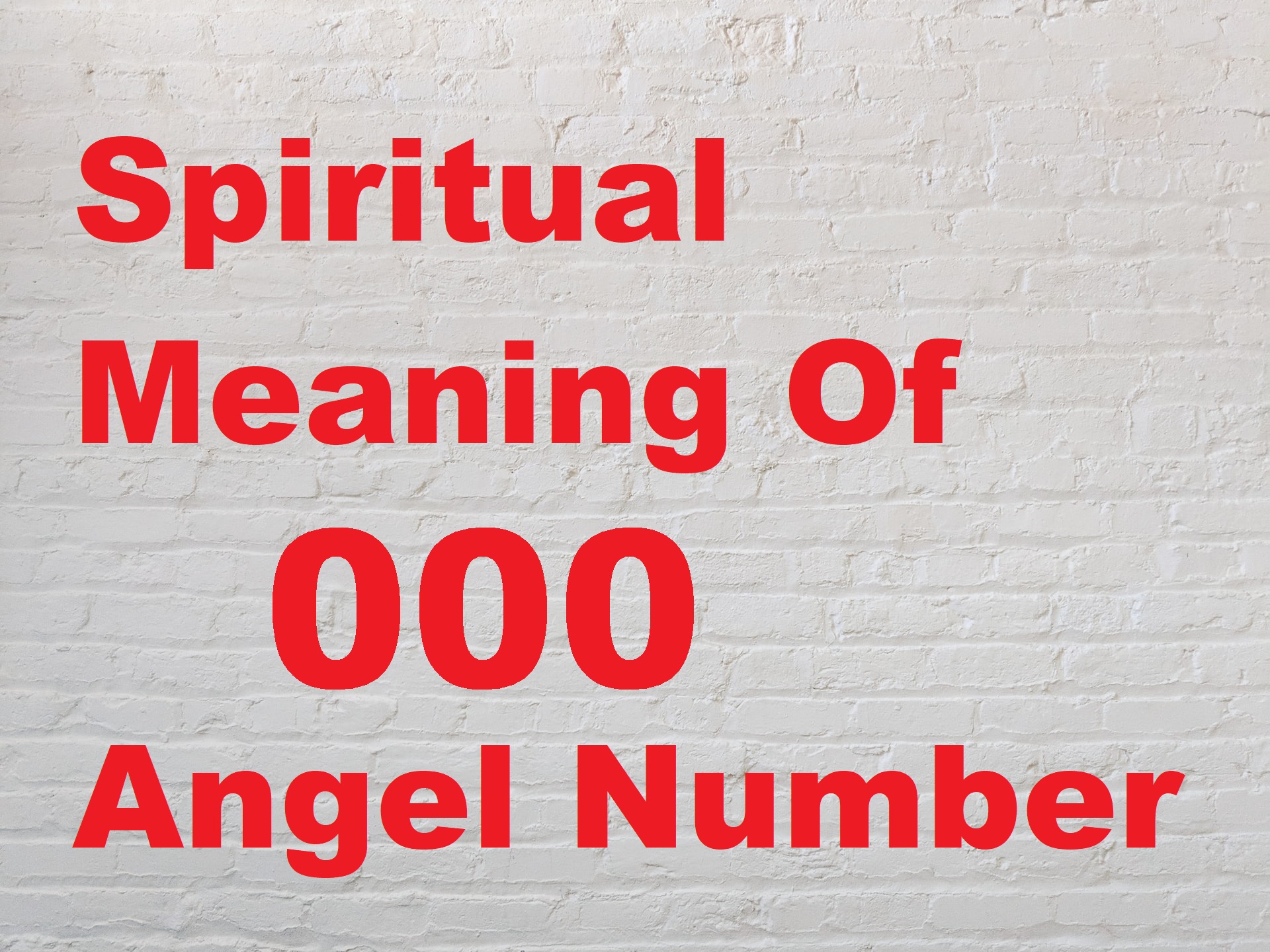 Spiritual Meaning Of 000 Angel Number text in red font color written on a white brick background