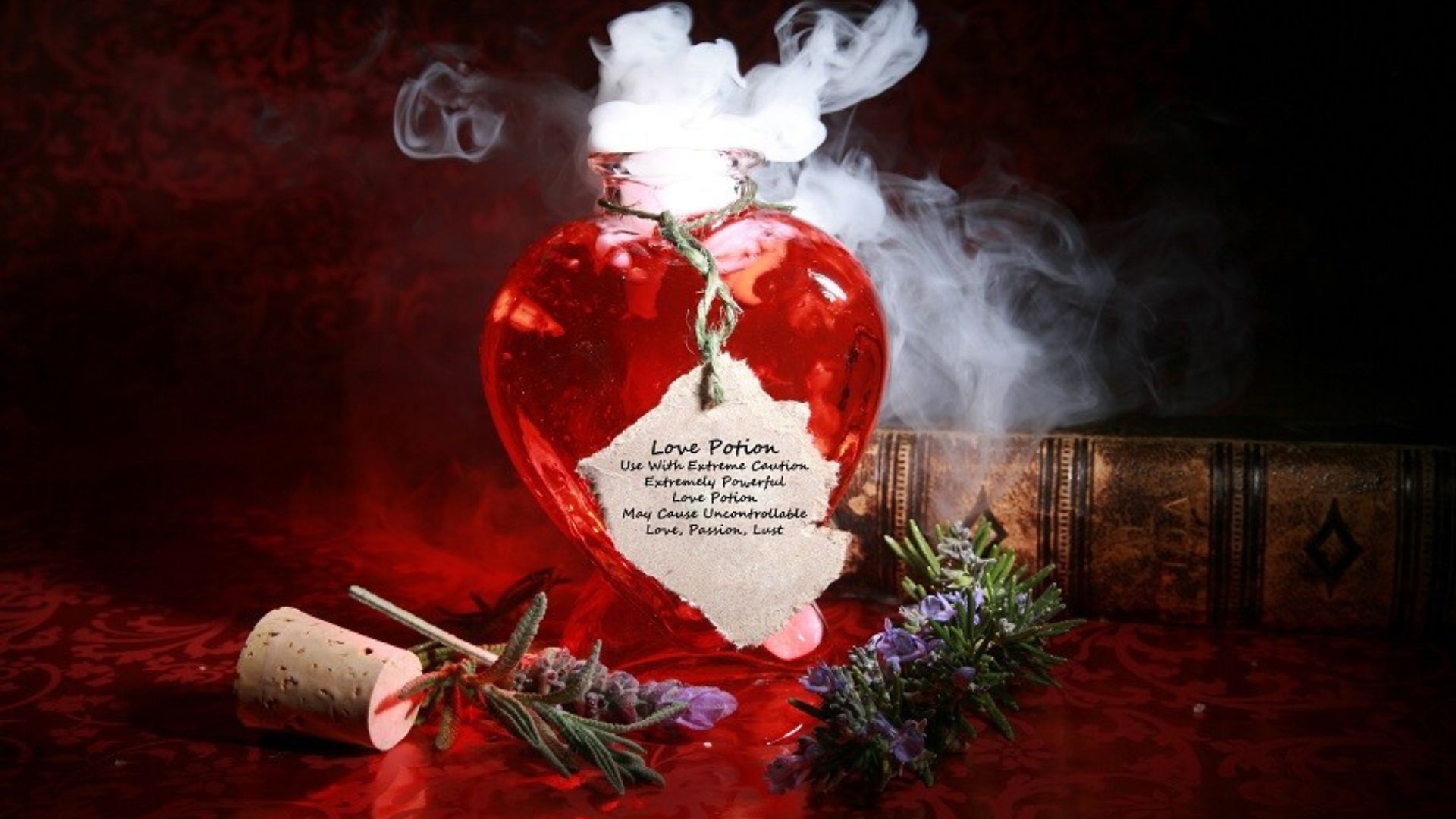 A Heart Shape Bottle Of Red Color Potion