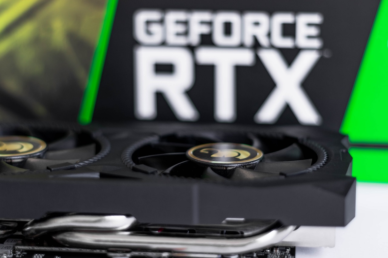 A closeup of an NVIDIA graphics card, with the words ‘GeForce RTX’ blurred in the background
