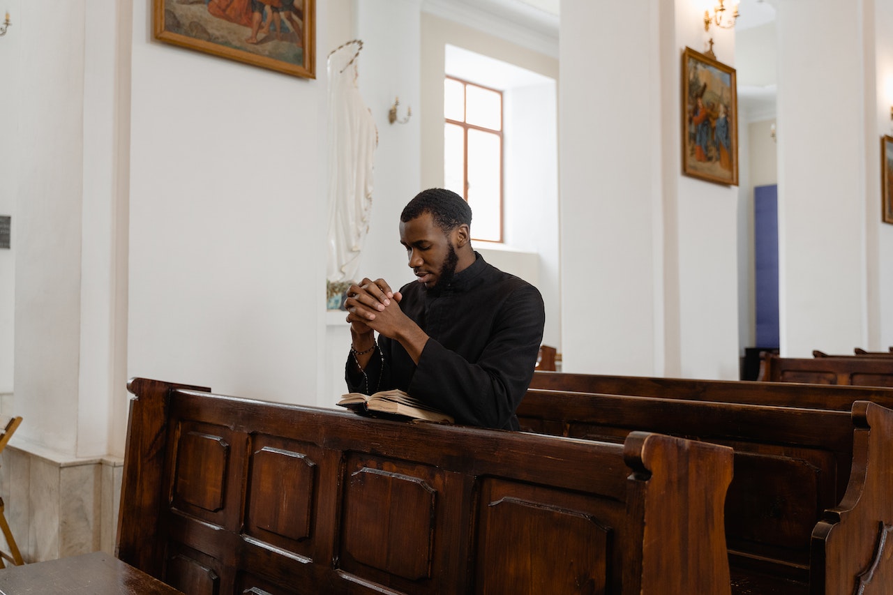 Priest Praying