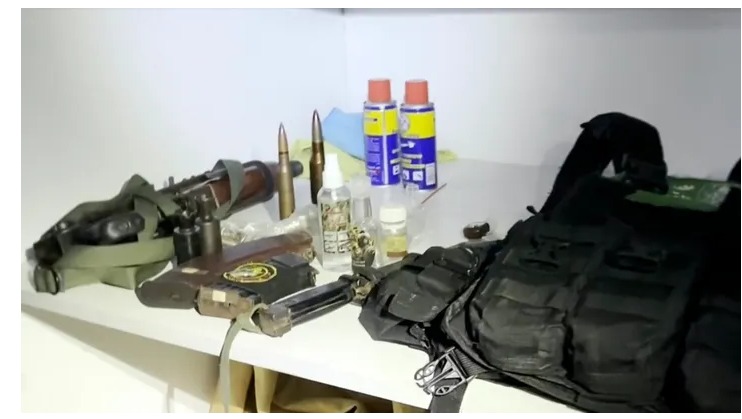 An image taken from a video released by the Israeli Defense Forces shows a bullet-proof vest with a Hamas insignia that was found along with weapons the IDF says were found in a medical closet at the MRI center at al-Shifa hospital in Gaza City.  (Israel Defense Forces via AP)