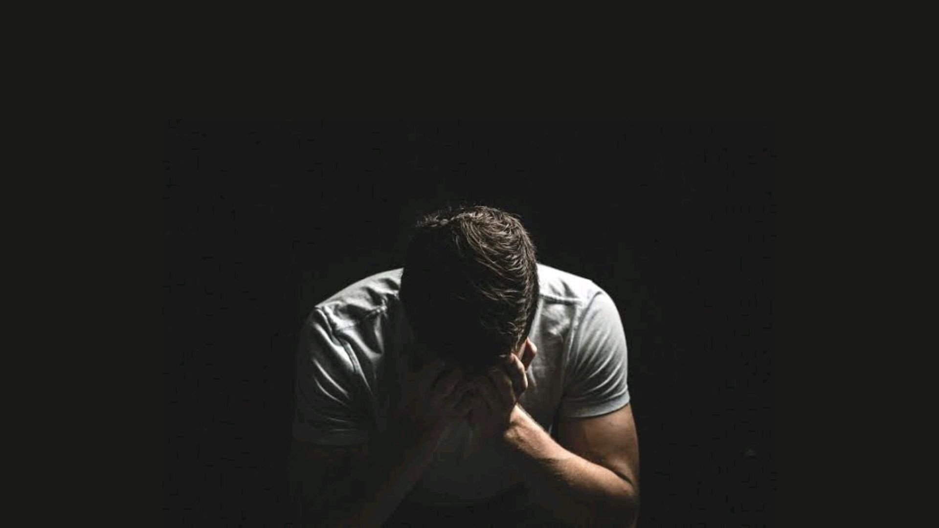 A Sad man Praying In Dark