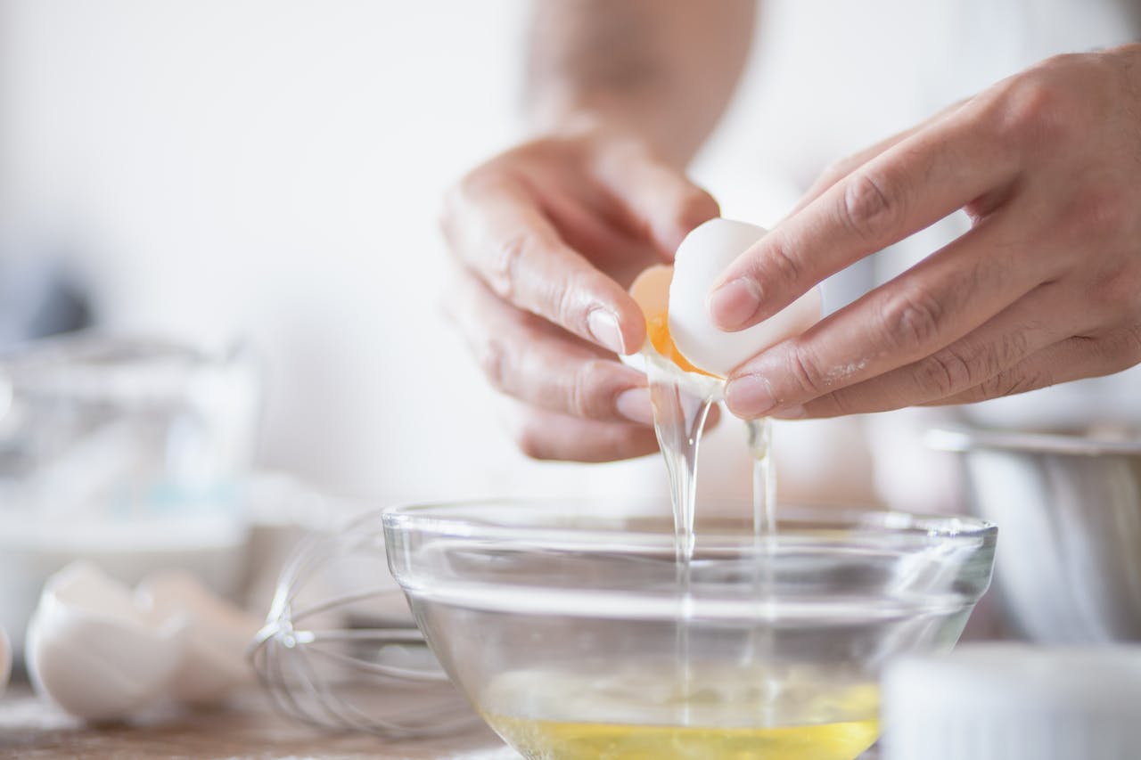 A Person Separating Egg White